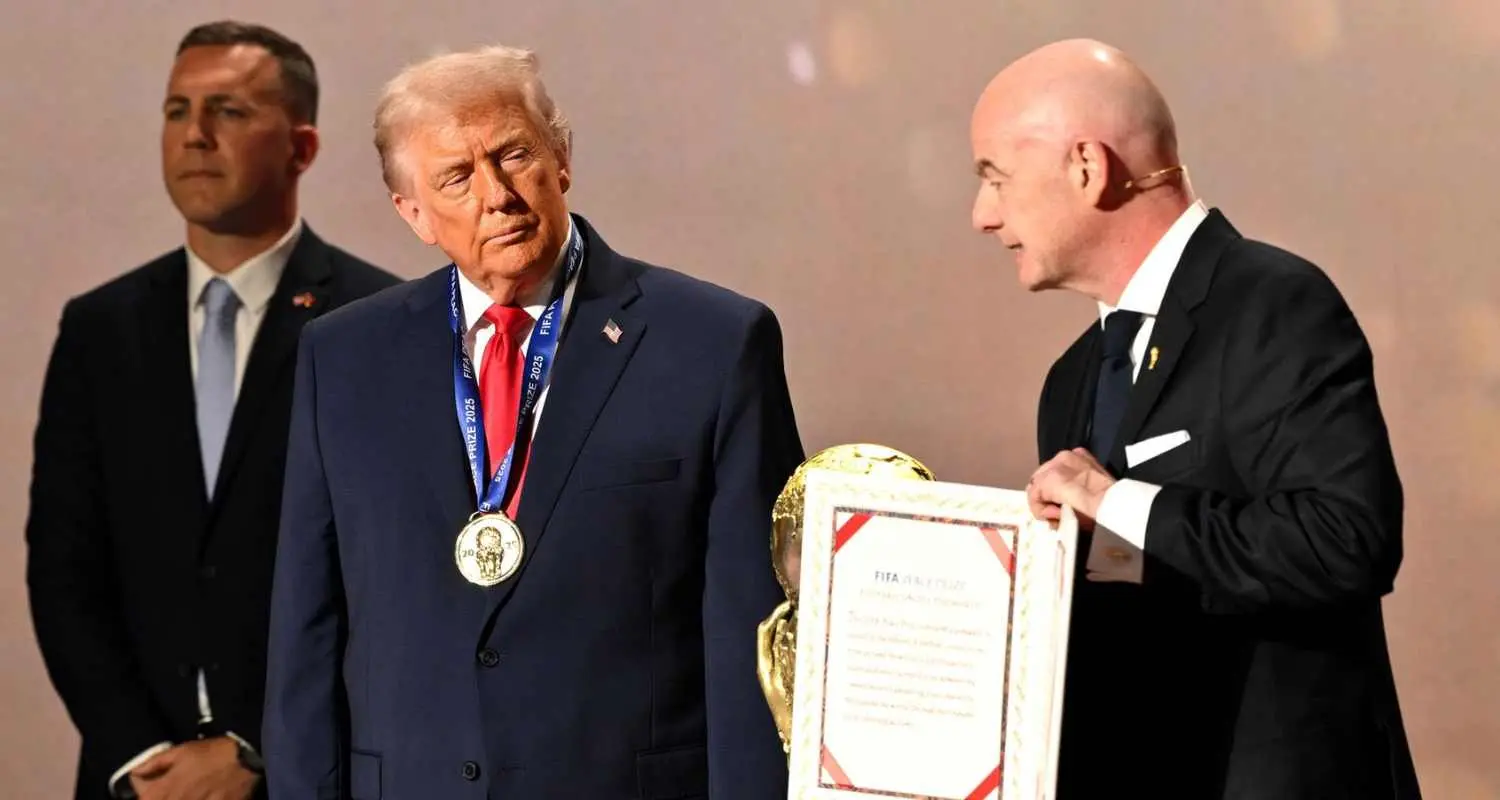 Donald Trump receiving FIFA Peace Award on stage