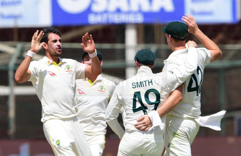 Pat Cummins celebrating after taking wicket in Adelaide Test
