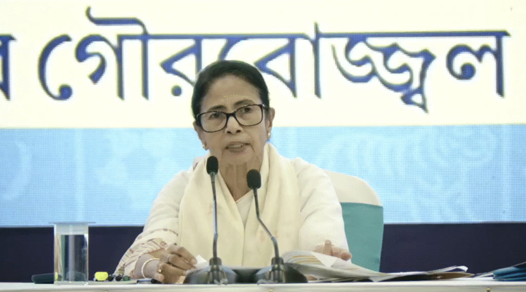 Mamata Banerjee presenting West Bengal government development report card