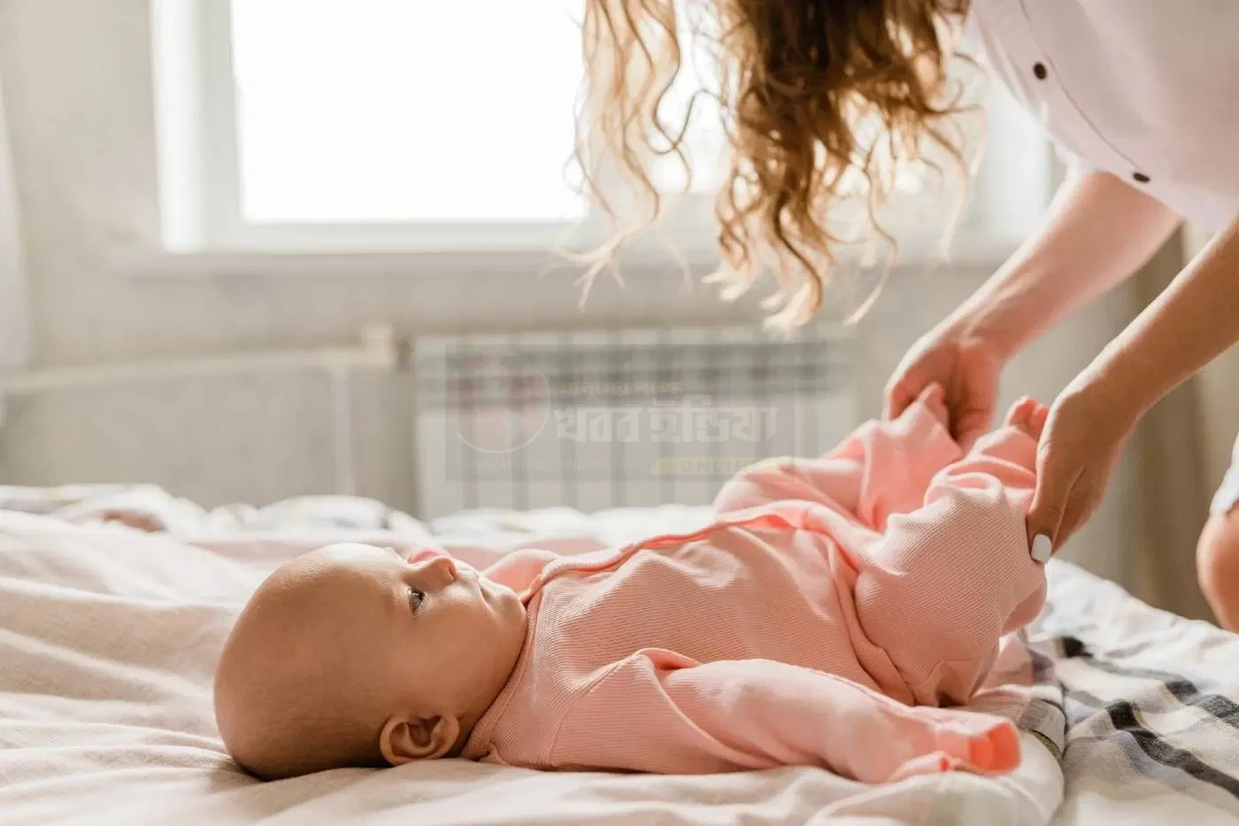 baby removing blanket while sleeping in winter